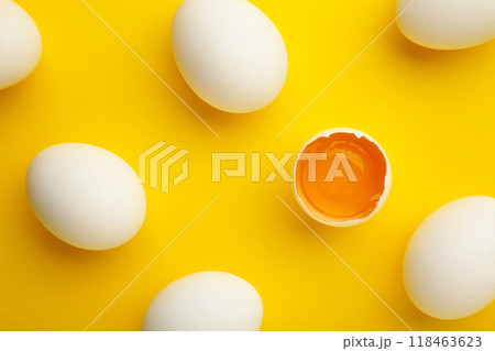 Easter decoration white eggs on yellow background. Easter concept. Easter decoration white eggs on yellow background. Easter concept. 118463623