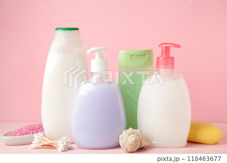 Collection of various beauty hygiene containers on pink background. Shower gel Collection of various beauty hygiene containers on pink background. Shower gel 118463677