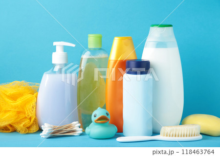 Toiletries baby on blue background. Baby shower gel 118463764