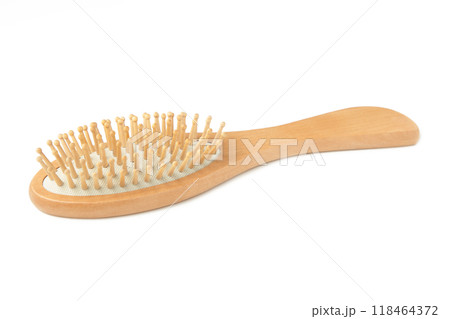 Wooden comb brush isolated on white background, clipping path. Wooden comb brush isolated on white background, clipping path. 118464372