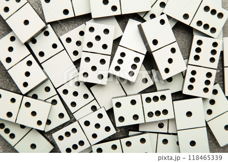 Domino pieces on the grey background. Macro photo Domino pieces on the grey background. Macro photo 118465339