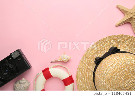Traveler accessories on pink background. Travel vacation concept. Summer background. Flat lay, top view. Traveler accessories on pink background. Travel vacation concept. Summer background. Flat lay, top view. 118465451