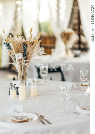 Detail of a wedding dinner setting, summer event Detail of a wedding dinner setting, summer event 118466724