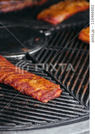 Mouthwatering Rack of Ribs on Round Grill. Glazed Barbecue Meat Over Hot Coals Mouthwatering Rack of Ribs on Round Grill. Glazed Barbecue Meat Over Hot Coals 118466802