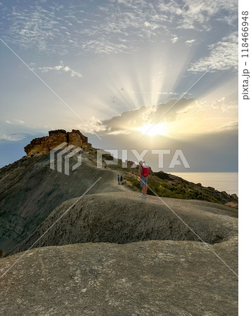 People walking on Qarraba Bay view point  at sunset 118466948