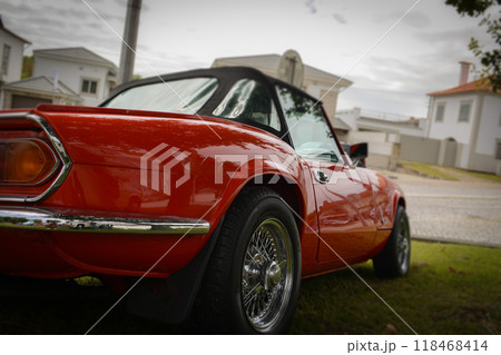 The interior of an old red retro car. Concept of love for retro style, vintage stuff, car enthusiasts 118468414