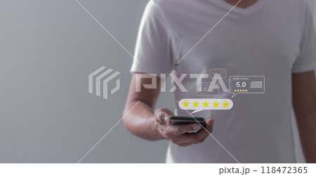 Satisfaction Review, Young Man hand using smartphone mobile touch five star Satisfaction Review, Young Man hand using smartphone mobile touch five star 118472365