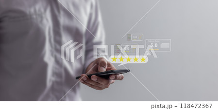Satisfaction Review, Young Man hand using smartphone mobile touch five star Satisfaction Review, Young Man hand using smartphone mobile touch five star 118472367