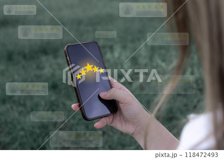 Customer Review, Young Woman hand using smartphone mobile touch five star to review  118472493