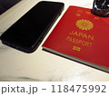 海外旅行の必需品、パスポートとスマホと腕時計 118475992