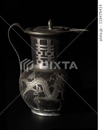 Chinese traditional teapot with dragon pattern and chinese characther double (Translation meaning is Double Happiness). Chinese traditional teapot with dragon pattern and chinese characther double (Translation meaning is Double Happiness). 118476414