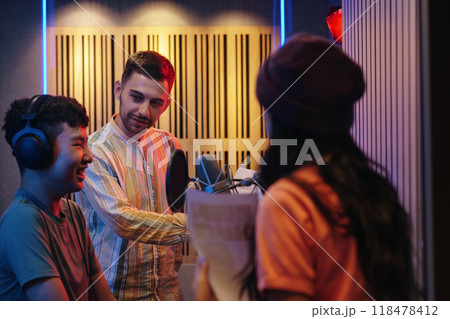 Recording Session With Sound Engineer Guiding Singing 118478412