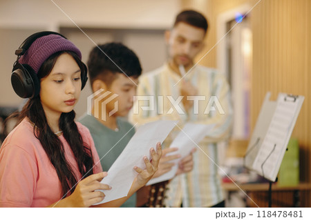 Preparing for Music Class Assignment in Study Room Preparing for Music Class Assignment in Study Room 118478481
