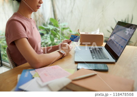 Playing Acoustic Guitar While Reading Music Notes Playing Acoustic Guitar While Reading Music Notes 118478508