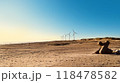 早朝の風力発電と褐色の砂浜 118478582