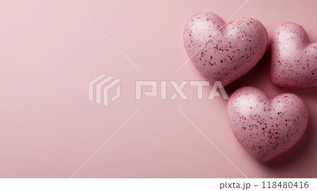 A heart-shaped formation crafted from delicate pink rose petals rests against a soft pastel backdrop 118480416