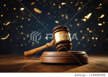 Judicial wooden gavel on defocused background with gold bokeh. 118480498