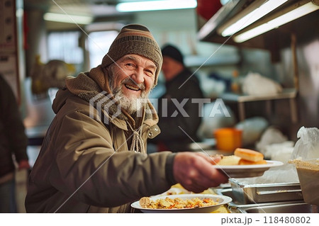 Portrait of a smiling homeless beggar with a plate of food 118480802
