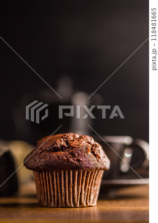 Sweet muffin cakes on wooden table. 118481665
