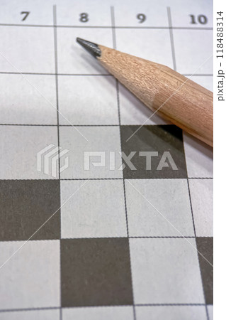 Mind Games.The Crossword Challenge.A close-up view of a crossword puzzle  118488314