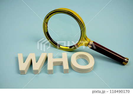 WHO? word with magnifying glass on blue background 118490170