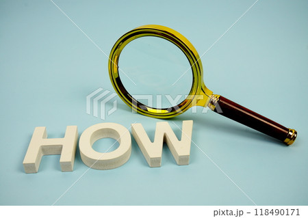 How to word with magnifying glass top view on blue background 118490171