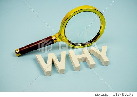 Why? word with magnifying glass on blue background 118490173