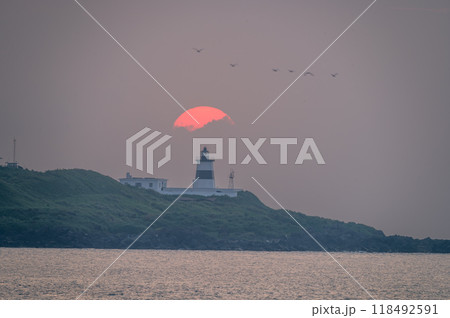 Sunset at the Lighthouse, New Taipei City, Taiwan. 118492591