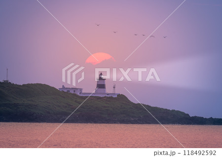 Sunset at the Lighthouse, New Taipei City, Taiwan. Sunset at the Lighthouse, New Taipei City, Taiwan. 118492592