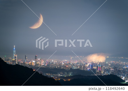 Crescent Moon Over Taipei City Fireworks on Qixi Festival. Crescent Moon Over Taipei City Fireworks on Qixi Festival. 118492640