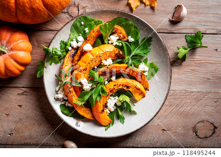 Autumn salad with grilled pumpkin, feta cheese 118495244
