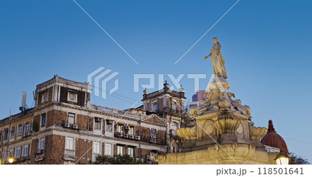 Mumbai, India. Close-up View On Flora Fountain In Dusk Time. Fountain Located At Hutatma Chowk Is Ornamentally Sculpted Architectural Heritage Monument. Located At Southern End Of Historic Dadabhai Mumbai, India. Close-up View On Flora Fountain In Dusk Time. Fountain Located At Hutatma Chowk Is Ornamentally Sculpted Architectural Heritage Monument. Located At Southern End Of Historic Dadabhai 118501641