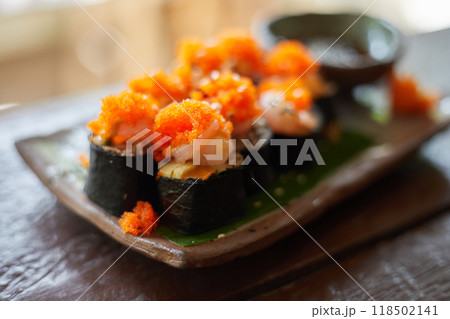Close up Sushi rolls with Ebiko 118502141