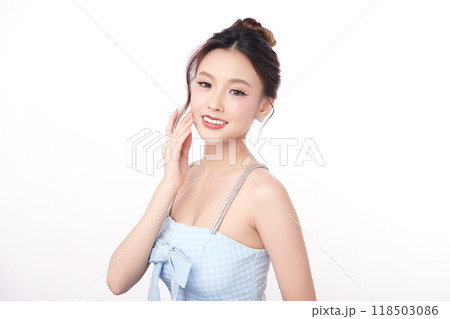 Beautiful young asian woman with clean fresh skin on white background, Face care, Facial treatment, Cosmetology, beauty and spa, Asian women portrait. Beautiful young asian woman with clean fresh skin on white background, Face care, Facial treatment, Cosmetology, beauty and spa, Asian women portrait. 118503086