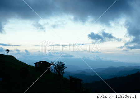 Silhouette of the person on the high mountain 118506511
