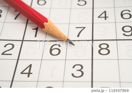Sudoku puzzle game playing to challenge brain. Sudoku puzzle game playing to challenge brain. 118507869
