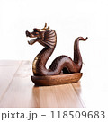 Wooden eastern style snake figure. Chinese zodiac concept for new year 2025 118509683