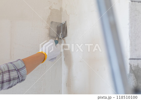 Aligning corners in walls with a spatula. Aligning corners in walls with a spatula. 118510100