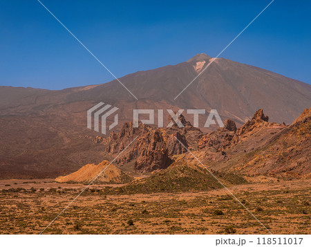 spot in Tenerife with many red rocks and beautiful mountain landscape background 118511017