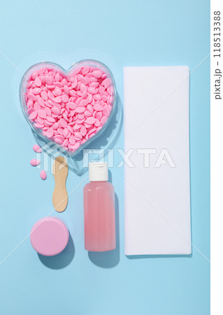 Accessories for waxing on a blue background Accessories for waxing on a blue background 118513388