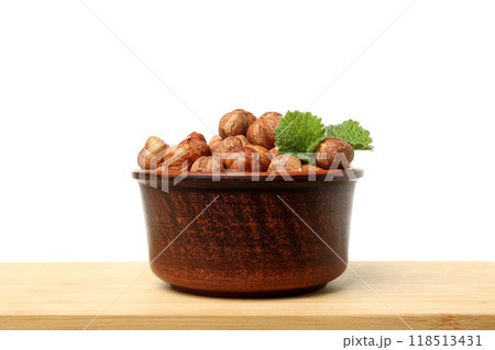 PNG, Peeled hazelnuts in bowl on wooden table, isolated on white background PNG, Peeled hazelnuts in bowl on wooden table, isolated on white background 118513431