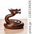 Wooden eastern style snake figure. Chinese zodiac concept for new year 2025 118514426