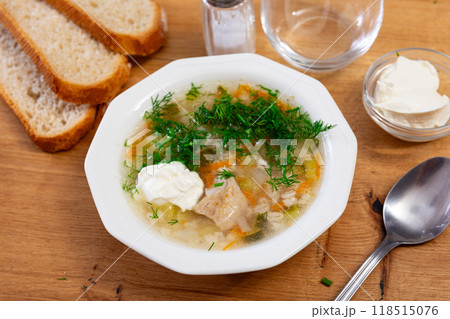 Traditional russian soup, rassolnik, served in bowl on table 118515076