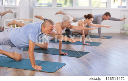 Senior male participant working out practice Balancing table, Dandayama Bharmansana Senior male participant working out practice Balancing table, Dandayama Bharmansana 118515472