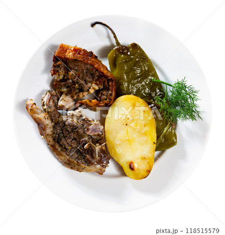 Fried fatty and juicy lamb and vegetable side dish of potato and bell pepper Fried fatty and juicy lamb and vegetable side dish of potato and bell pepper 118515579