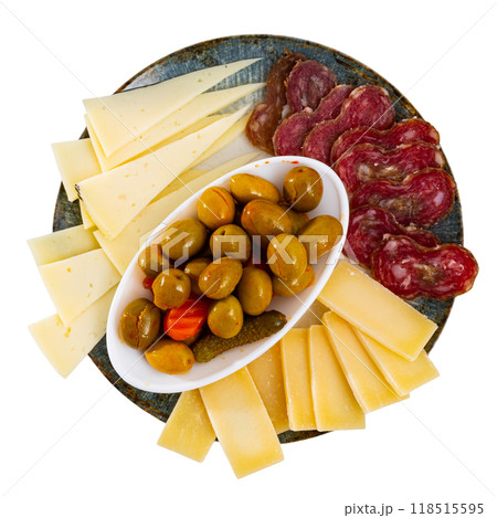 Snack plate - slicing several varieties of cheese, smoked sausage butifarra Snack plate - slicing several varieties of cheese, smoked sausage butifarra 118515595