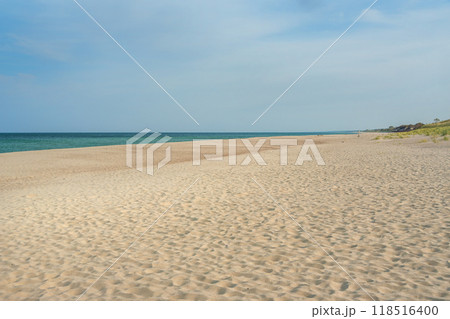 Long white sand beach in the Curonian Spit National Park. Kaliningrad region. Russia Long white sand beach in the Curonian Spit National Park. Kaliningrad region. Russia 118516400