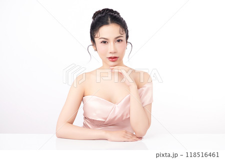 Beautiful young asian woman with clean fresh skin on white background, Face care, Facial treatment, Cosmetology, beauty and spa, Asian women portrait. Beautiful young asian woman with clean fresh skin on white background, Face care, Facial treatment, Cosmetology, beauty and spa, Asian women portrait. 118516461