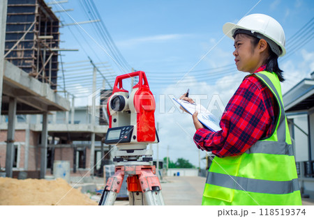 Engineers holding documents for planning and design for project at worksite, Engineering and architecture concept, Engineer working at site of a large building project. Engineers holding documents for planning and design for project at worksite, Engineering and architecture concept, Engineer working at site of a large building project. 118519374