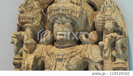 Close Up View On Statue Of Bhairava Or Frightful, Or Kala Bhairava, Is Shaivite And Vajrayana Deity Worshipped By Hindus And Buddhists. Antique Museum Piece Of Hoyasala Period, Karnataka 12th Century 118520102